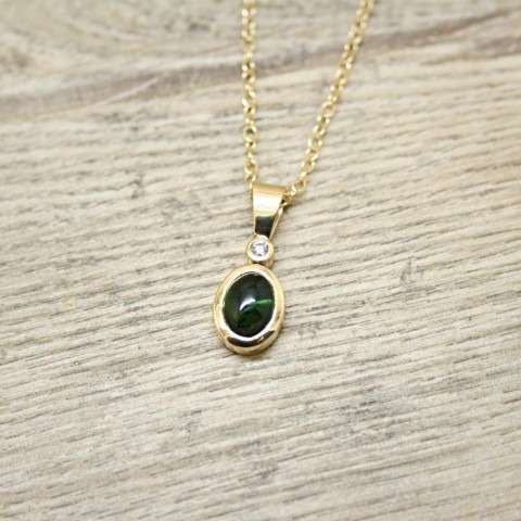 18ct yellow gold pendant with tourmaline cabochon and round white diamond 18ct yellow gold pendant with tourmaline cabochon and round white diamond Victoria Jarman Jewellery