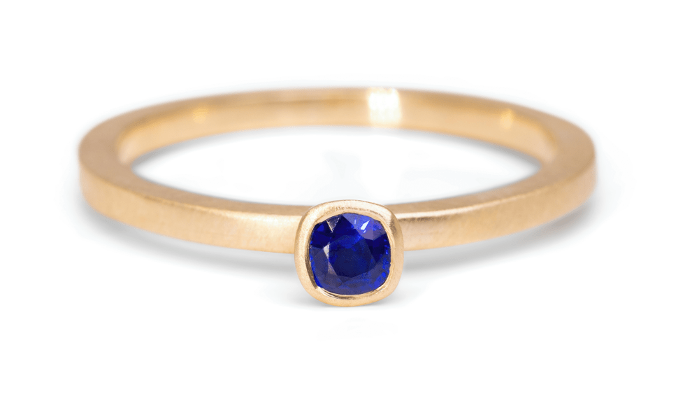Cushion cut blue sapphire in 9ct Fairmined yellow gold ring Cushion cut blue sapphire in 9ct Fairmined yellow gold ring Victoria Jarman Jewellery