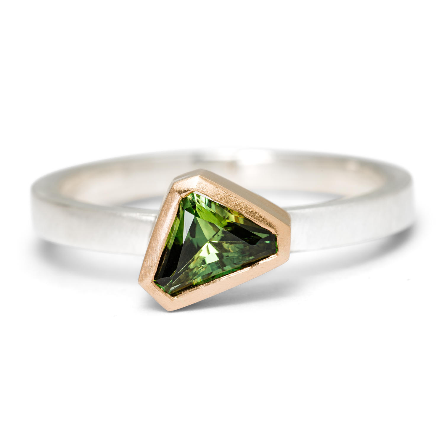 Freeform cut green Australian sapphire in Fairmined gold and silver Freeform cut green Australian sapphire in Fairmined gold and silver Victoria Jarman Jewellery